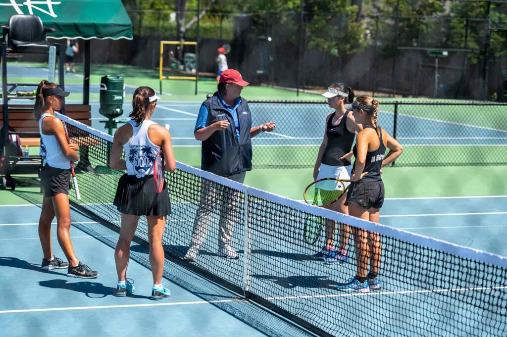 junior tennis coaching session