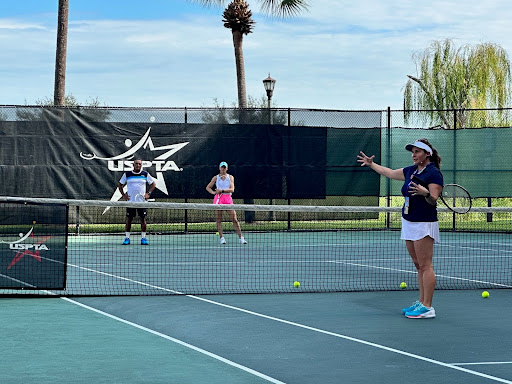 katie-delich-on-tennis-court
