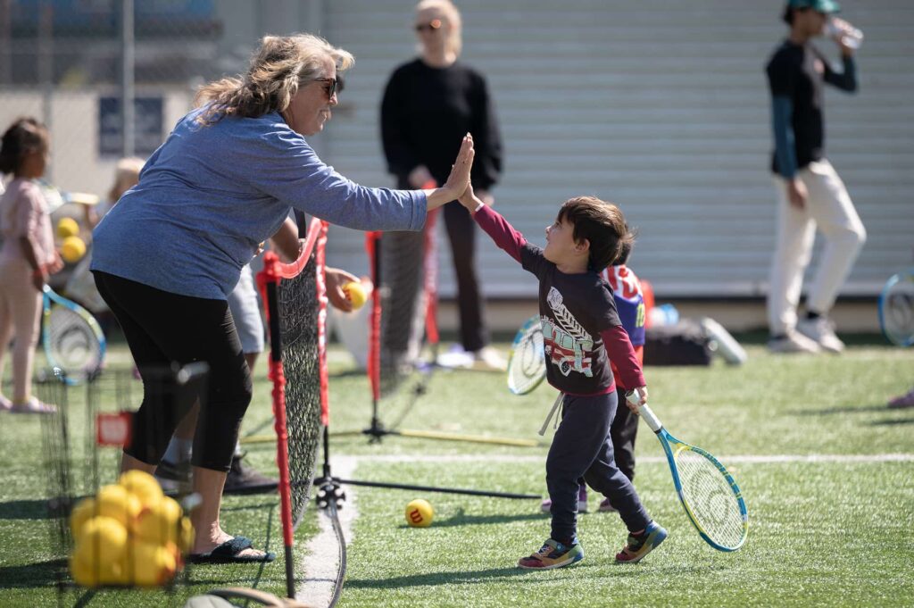 kids tennis high five