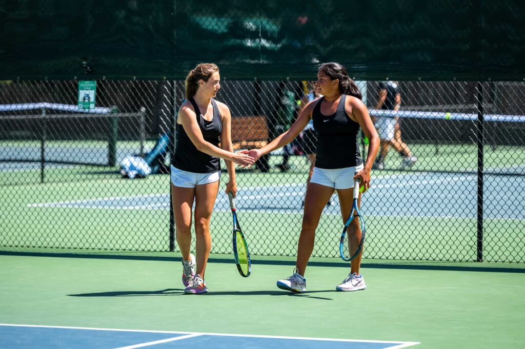 teammate shaking hands